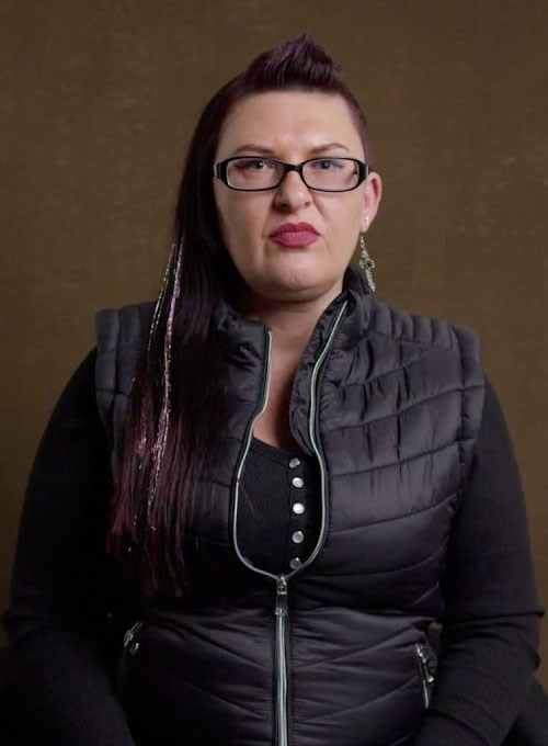 A portrait of Claire Millar looking serious
