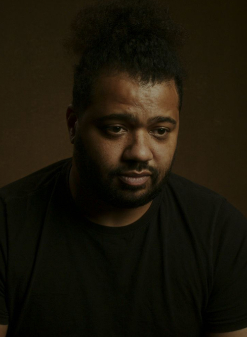 A head and shoulder portrait of a very sad man called Wes